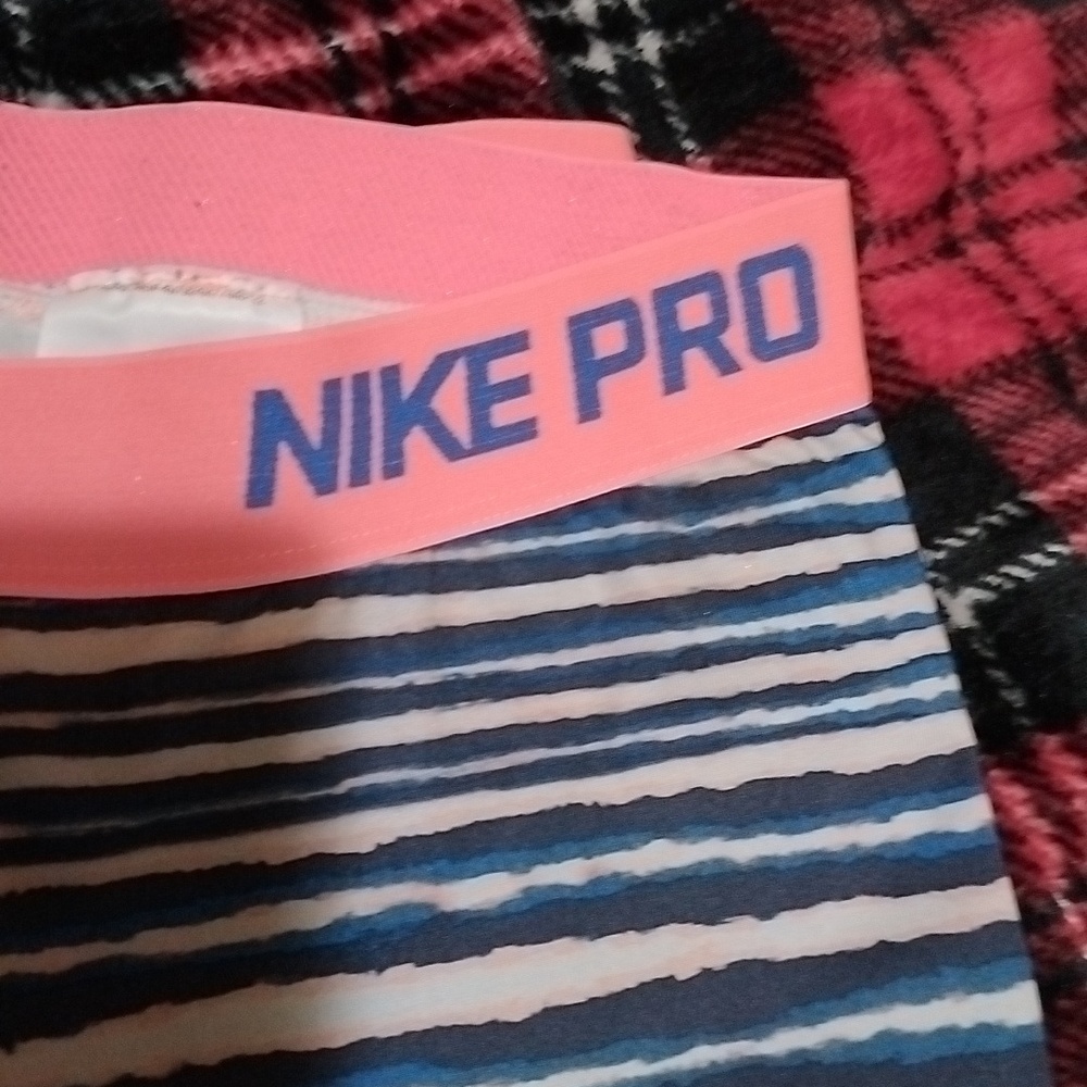 Women's Nike pro sport leggings size medium coral pink blue zebra print ish